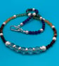 Multi-gem necklace with Chakra colours and sterling silver