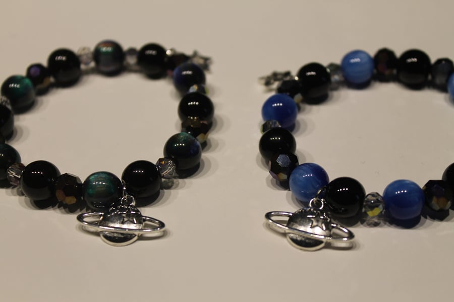 space themed beaded bracelets with planet and star charms, galaxy bracelets