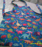 Colourful Dinosaurs on Blue Childs Apron