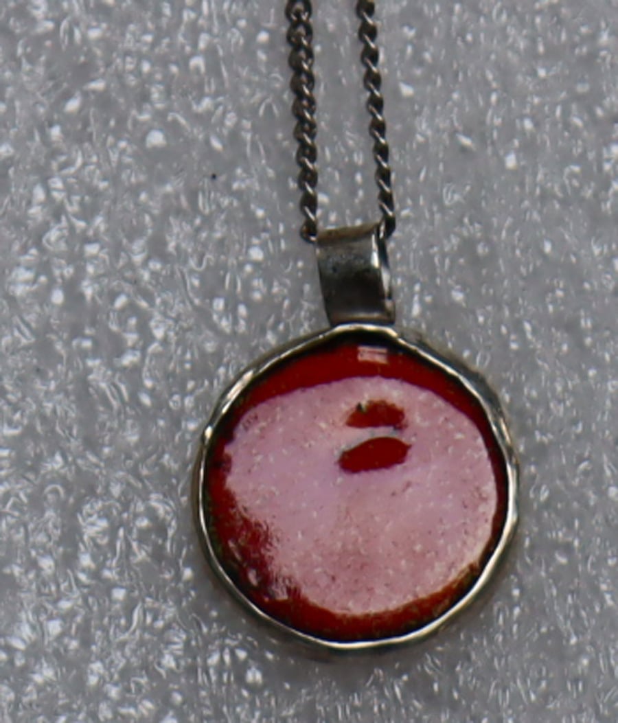 Red ball enamel pendant set in silver