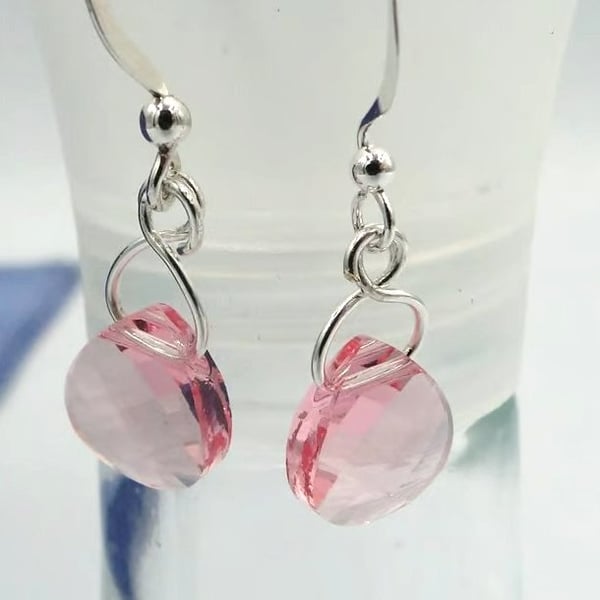 Pretty pink crystal earrings on a silver hook.  Stocken fillers  Sparkly