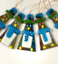 Luminescent fused glass Christmas penguins