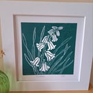 An original handprinted linoprint of bluebells.