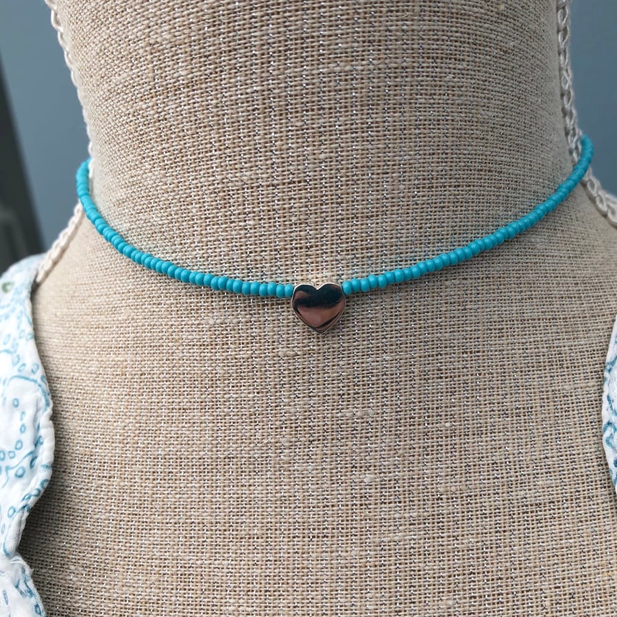 Mid blue seed bead choker with sterling silver heart.