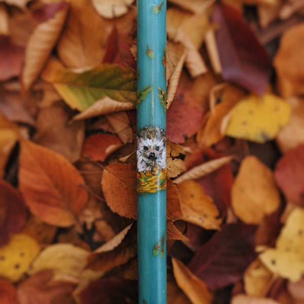 Beautiful hedgehog candle in blue green