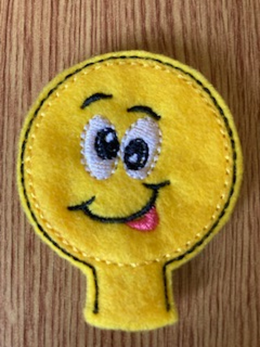66  Silly emoji pencil topper