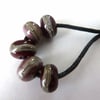 handmade lampwork glass beads, red and purple