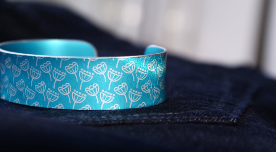 Geometric seed head print cuff bracelet turquoise