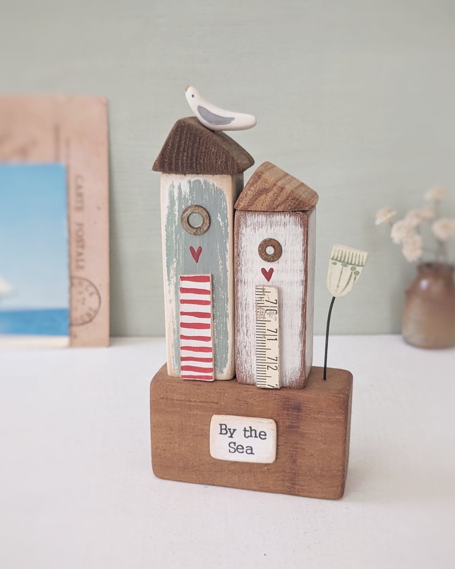 Tall Wooden Sea Huts with Clay Flower and Seagull 'By the Sea'