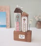 Tall Wooden Sea Huts with Clay Flower and Seagull 'By the Sea'