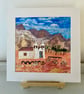 A place to gather, little white church set in a desert landscape  - Image 1