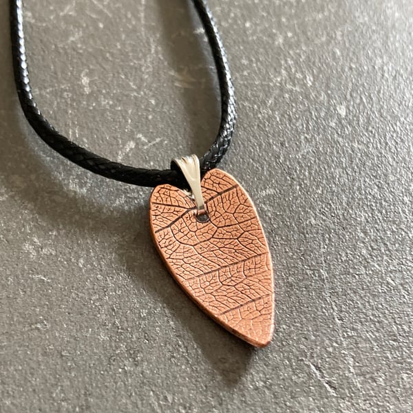 Leaf textured copper elongated heart pendant