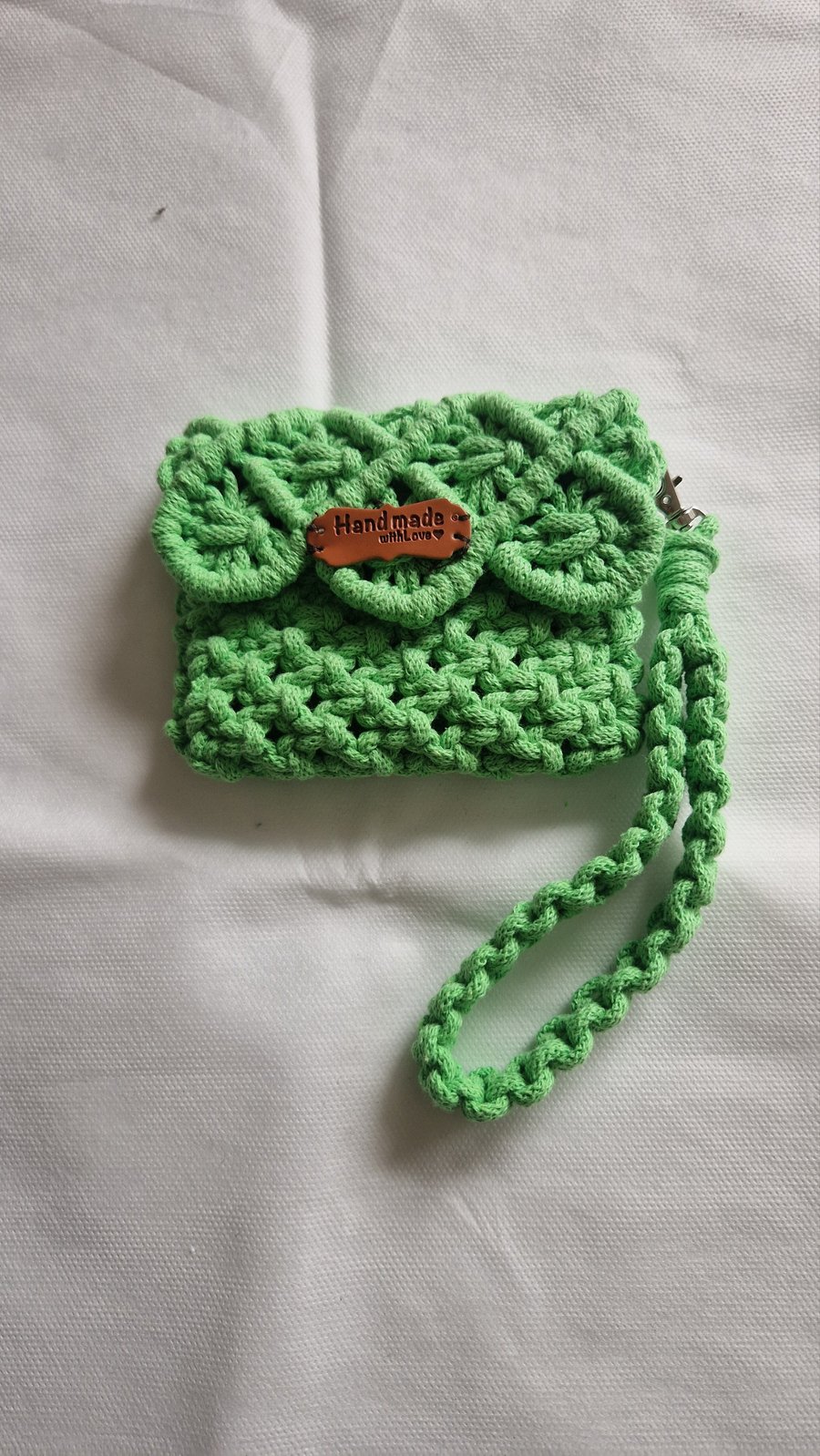 Purse with detachable wrist strap