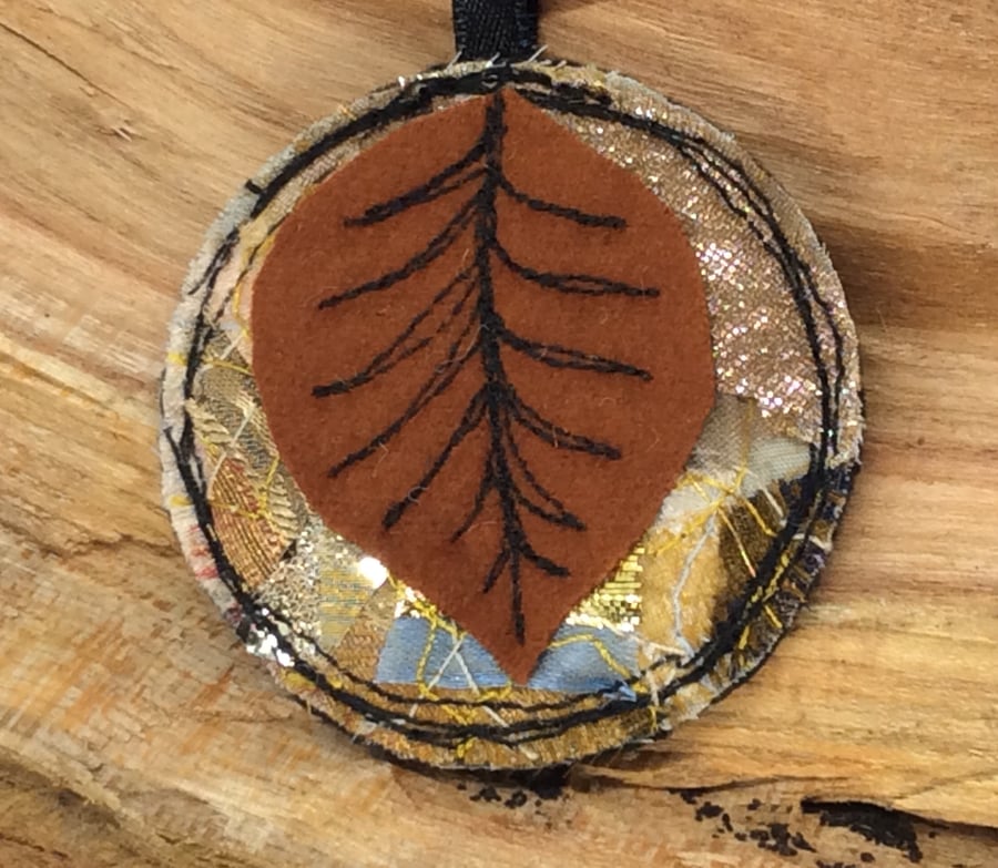 Up-cycled embroidered leaf necklace or pendant. 