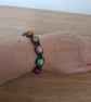 BLACK AND MULTI COLOURED MACRAME BRACELET. - Image 4