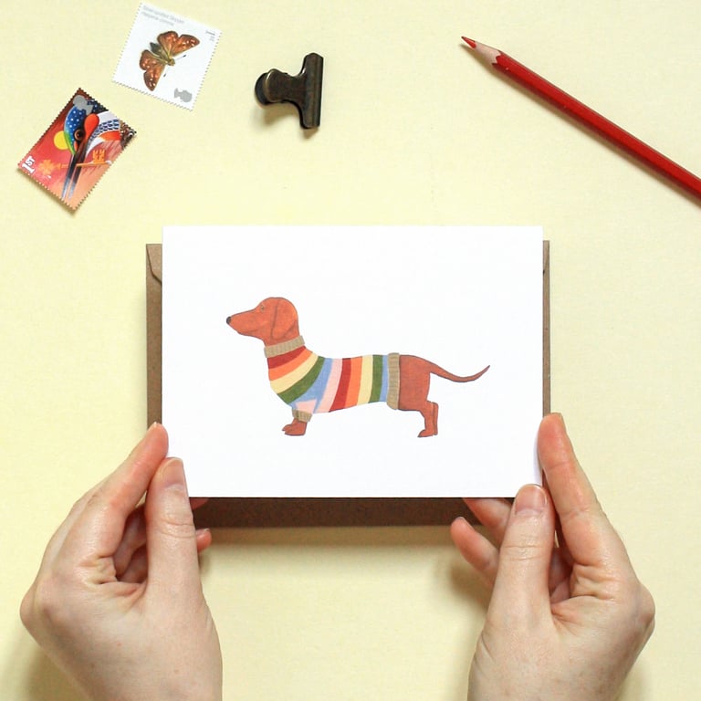 Dachshund in a striped sweater illustrated Greeting Card