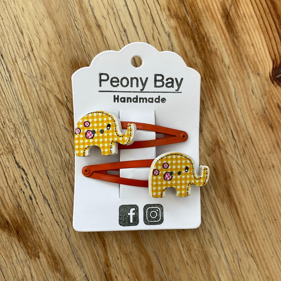 Hair clips with elephants in yellow & orange