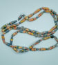 Handmade peach, grey and gold coloured paper bead necklace with agate accents. - Image 1