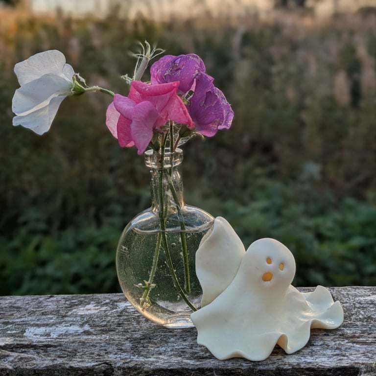 Isobel - vintage glass bud vase held by glow in the dark ghost
