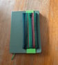 Pen and pencil holder for A5 notebook or journal