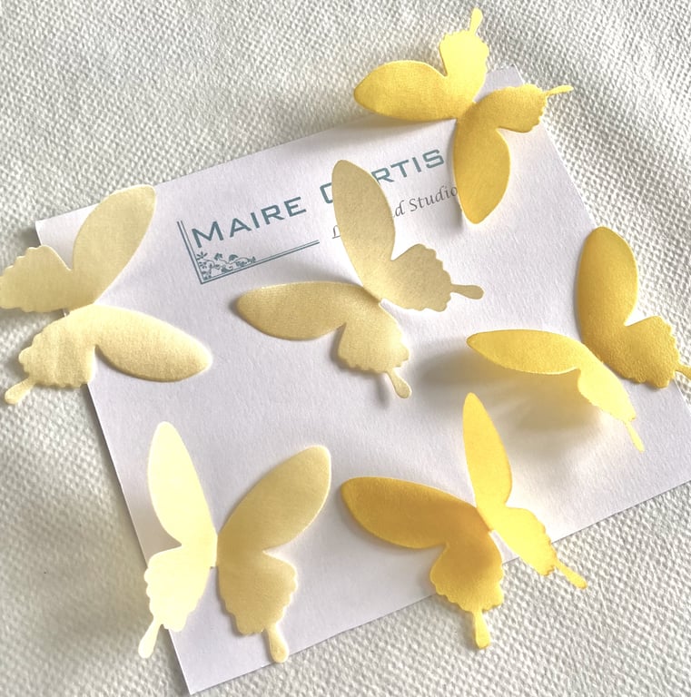 Silk satin swallowtail butterflies in shades of yellow