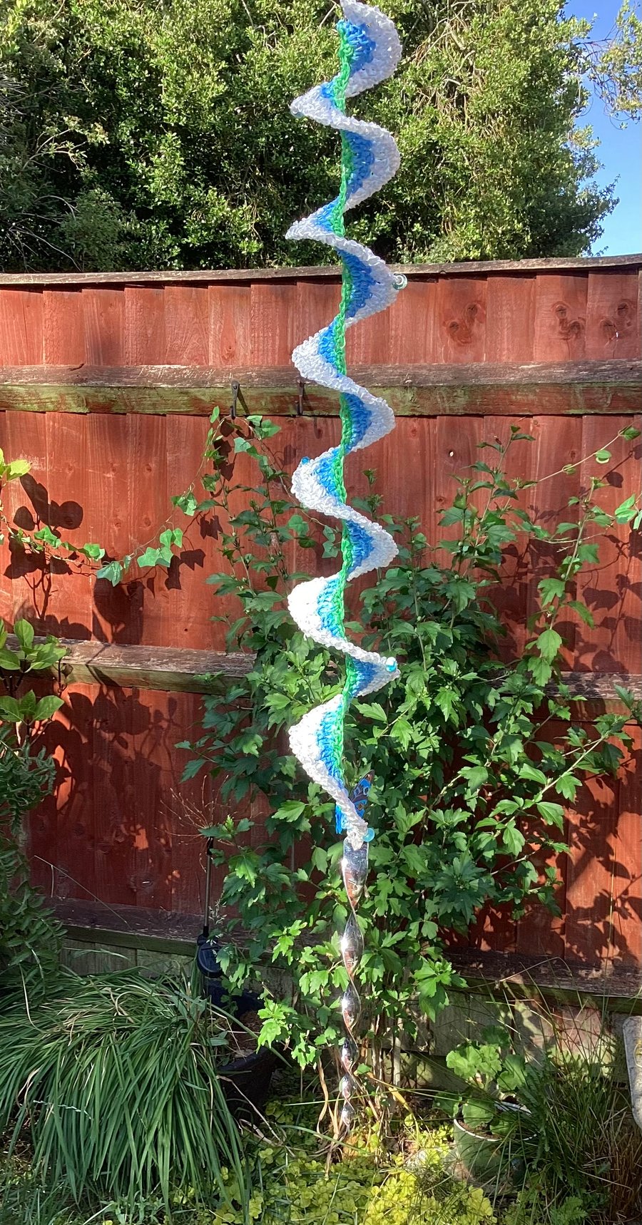 Crochet wind spinner in green, blue and white