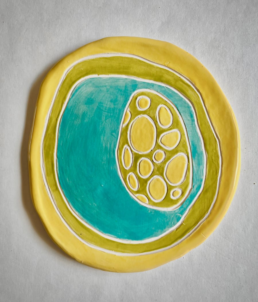 Yellow ceramic handmade wall plaque