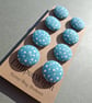 Set of eight scrap bag buttons - teal cotton fabric with white dots and circles 