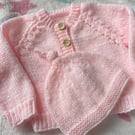 Pink baby cardigan and matching hat
