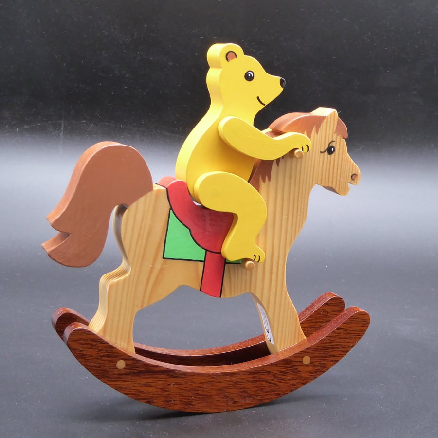 Wooden Teddy Bear on Rocking Horse