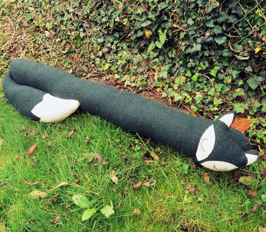 Long fox.  A draught excluder made from Donegal pure new wool.  Draft excluder.