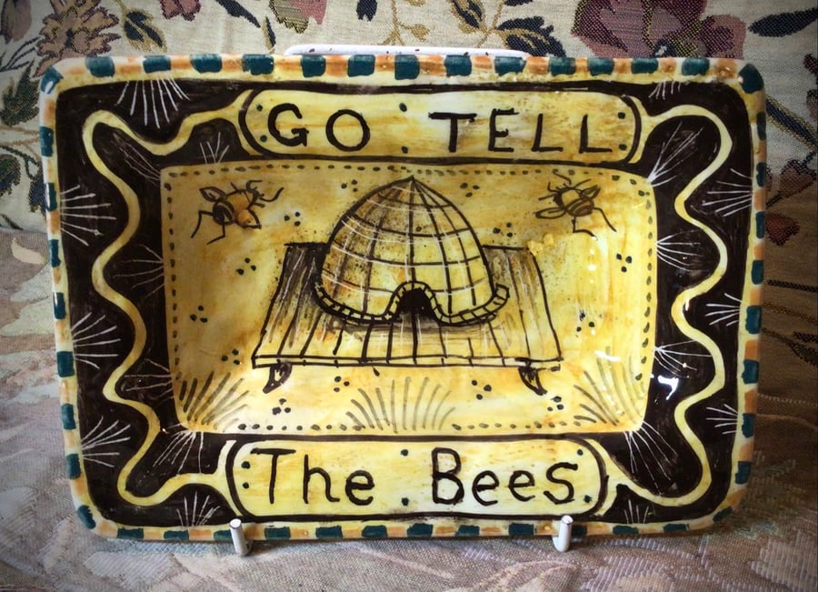 Square slip ware dish with hand painted bee skep