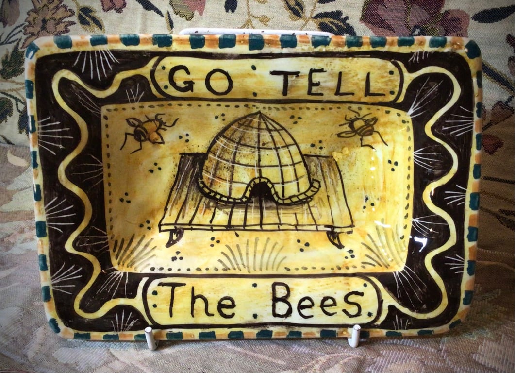 Square slip ware dish with hand painted bee skep