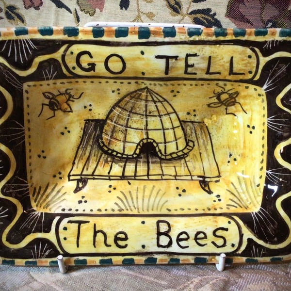 Square slip ware dish with hand painted bee skep