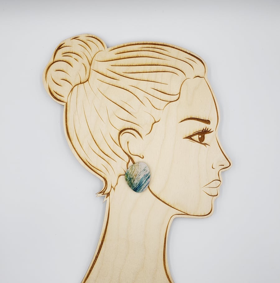 Pebble shaped stud earrings in a scribble print design