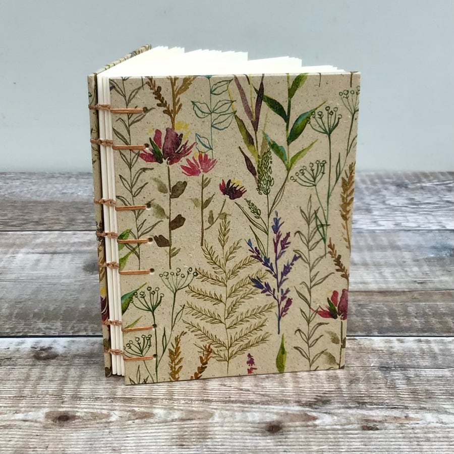 Journal Notebook Hand bound in Coptic Stitch covered with Wildflowers Paper 