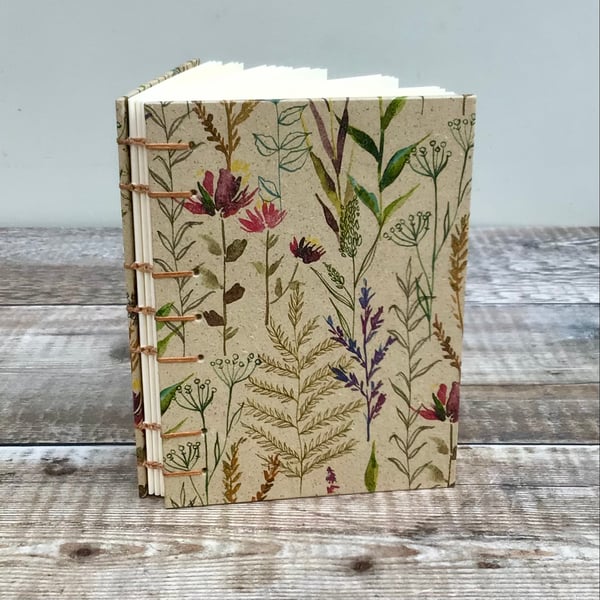 Journal Notebook Hand bound in Coptic Stitch covered with Wildflowers Paper 