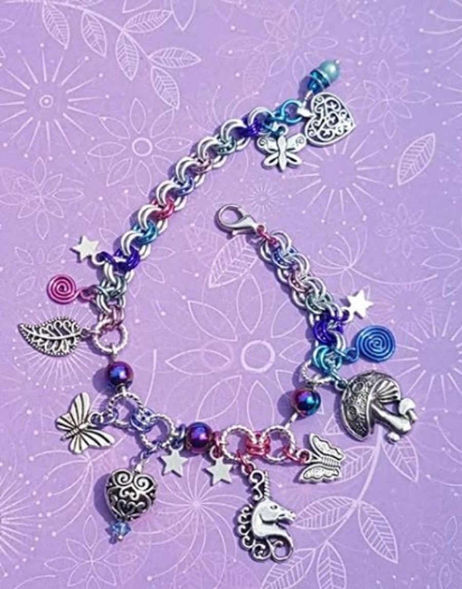 Unicorn Charm bracelet with woodland charms 