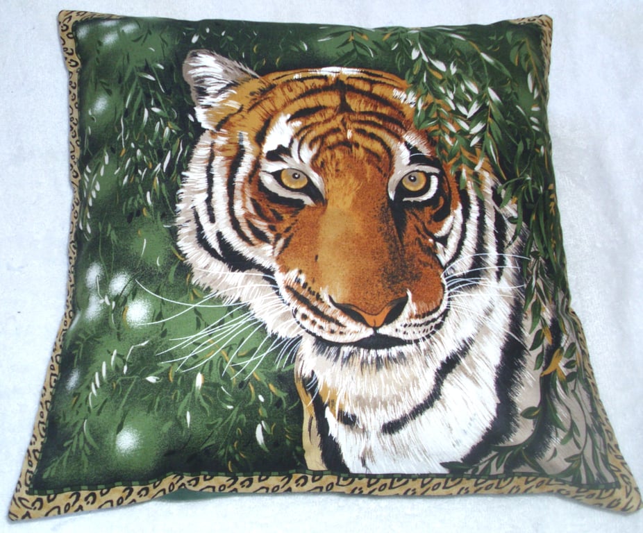 On Safari magnificent Tiger emerging from forest cushion