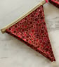 Bunting red & gold bubbles 23 flags 3.5 metres on gold bias binding