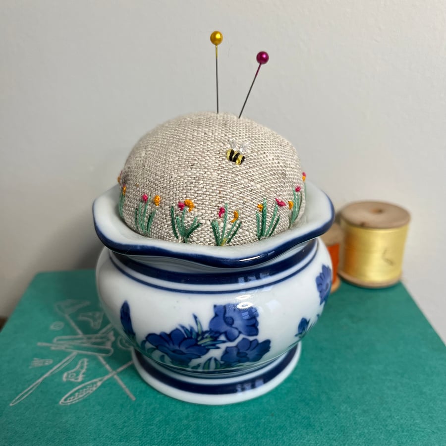 Blue and white vase embroidered pin cushion with bee and flowers