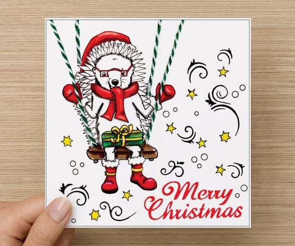 Hedgehog Dougal themed, illustrated Christmas card (14 x 14 cm) with an envelope