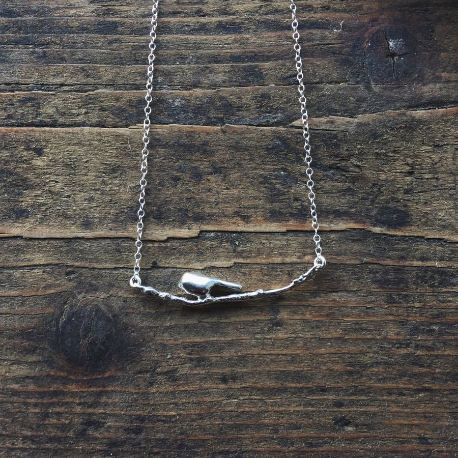 Sterling silver bird on a branch necklace
