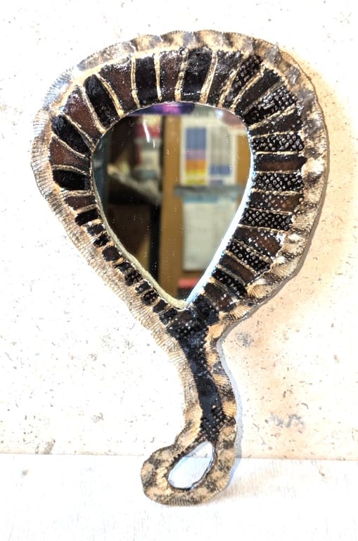 Sweet, hand-held, ceramic framed mirrors with beautiful cotton fabric backing