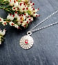 Recycled Fine Silver Daisy Pendant with Garnet Cubic Zirconia - Image 1