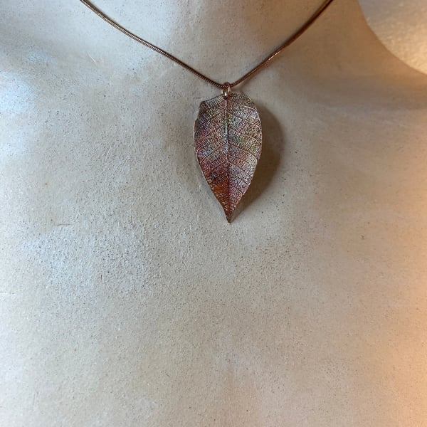 Copper leaf pendant with rainbow patina