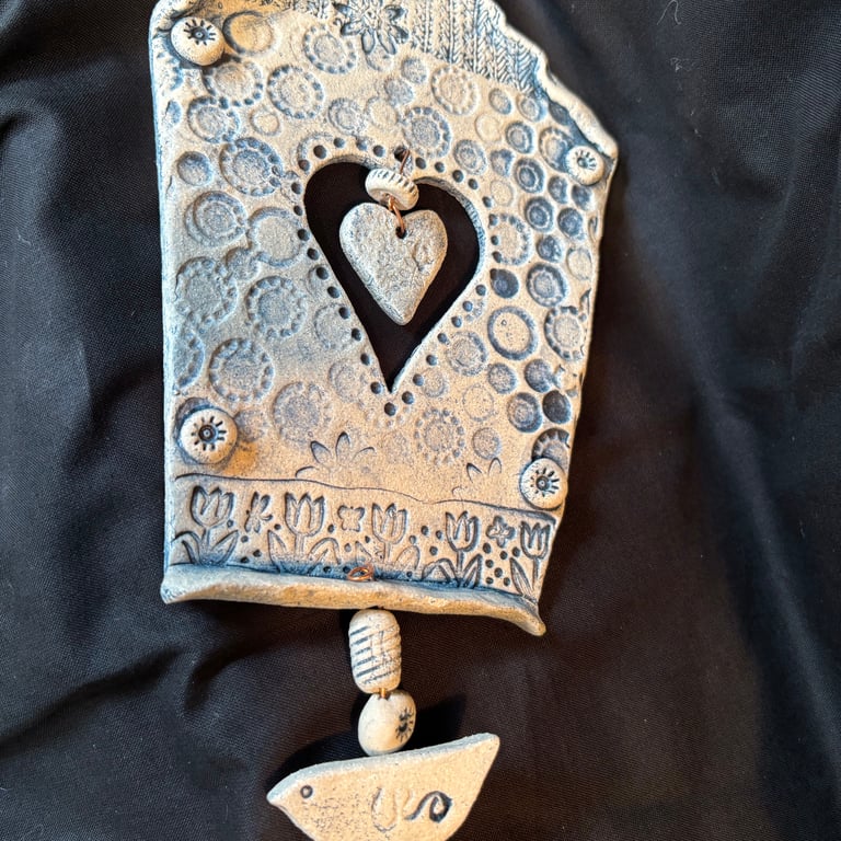 Blue and white embossed wall hanging