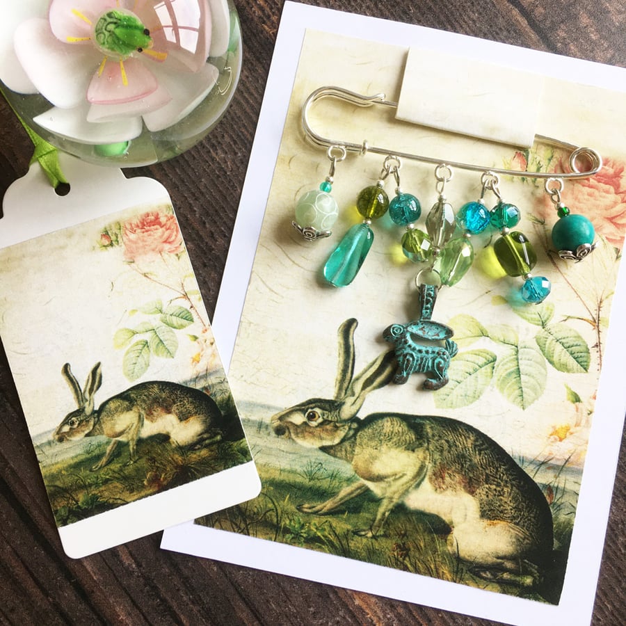 Embellished kilt pin with Mykonos verdigris hare and gift tag