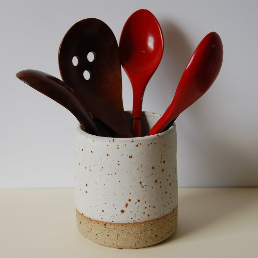 Minimalist ceramic pot  made from natural materials in a modern style.