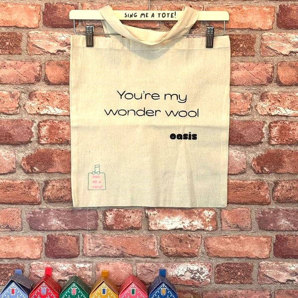 Wool storage tote bag for knitting or crochet featuring an oasis song pun. 